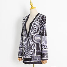 Load image into Gallery viewer, Step up your style game with our Silver Pearl Blazer, a stunning black blazer embellished with elegant pearls and a shimmering silver design. This statement piece exudes modern sophistication and adds an eye-catching flair to any look. Available in sizes S to 2XL, it&#39;s the perfect blend of timeless elegance and bold luxury. Make a lasting impression with every wear, whether you&#39;re heading to a chic event or making a fashion-forward entrance.
