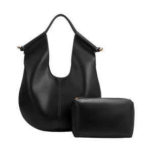 Effortlessly chic and highly functional, the Black Leather Tote Bag is your go-to bag for workdays and weekends alike. Crafted from recycled vegan leather, it features a knotted handle design accented with luxurious gold-tone hardware. Its spacious interior offers ample room for all your essentials, complete with a removable pouch and slip pockets for easy organization.