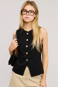 Elevate your wardrobe with this timeless pinstriped vest, featuring an all-over pinstripe pattern that exudes sophistication. Designed with a round neckline and a buttoned front, this sleeveless waistcoat is perfect for layering or wearing solo. Its regular-length fit and split hem add a touch of contemporary flair, making it a versatile piece for both casual and dressy looks. Style it with tailored trousers for a polished ensemble or over a crisp shirt for a chic, preppy vibe.