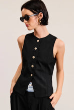 Load image into Gallery viewer, Elevate your wardrobe with this timeless pinstriped vest, featuring an all-over pinstripe pattern that exudes sophistication. Designed with a round neckline and a buttoned front, this sleeveless waistcoat is perfect for layering or wearing solo. Its regular-length fit and split hem add a touch of contemporary flair, making it a versatile piece for both casual and dressy looks. Style it with tailored trousers for a polished ensemble or over a crisp shirt for a chic, preppy vibe.
