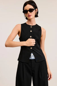 Elevate your wardrobe with this timeless pinstriped vest, featuring an all-over pinstripe pattern that exudes sophistication. Designed with a round neckline and a buttoned front, this sleeveless waistcoat is perfect for layering or wearing solo. Its regular-length fit and split hem add a touch of contemporary flair, making it a versatile piece for both casual and dressy looks. Style it with tailored trousers for a polished ensemble or over a crisp shirt for a chic, preppy vibe.