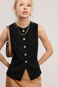 Elevate your wardrobe with this timeless pinstriped vest, featuring an all-over pinstripe pattern that exudes sophistication. Designed with a round neckline and a buttoned front, this sleeveless waistcoat is perfect for layering or wearing solo. Its regular-length fit and split hem add a touch of contemporary flair, making it a versatile piece for both casual and dressy looks. Style it with tailored trousers for a polished ensemble or over a crisp shirt for a chic, preppy vibe.