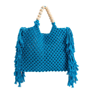 Introducing our latest addition to the family, our Blue Crochet Large Tote Bag, the perfect tote bag with both fashion and practicality. Designed with a hand knitted crochet look with fringe on the sides and wooden beads along the handle. This crochet bag is spacious enough to carry a standard size tablet and all your warm weather essentials.