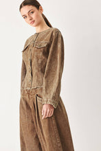 Load image into Gallery viewer, Women's vintage-washed brown denim jacket with a collarless round neckline, button front, chest pockets and sculpted fitted waist.
