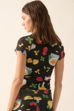 Load image into Gallery viewer, Model wearing the colorful Italian food print mesh set from Glam Expressway, featuring a fitted long sleeve crop top and a high-waisted foldover waistband maxi skirt with pasta, pizza, and tomato motifs — perfect for bold, statement resort wear or summer styling.
