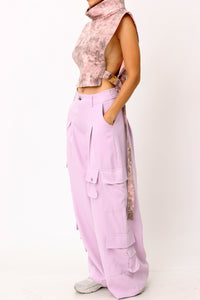 The Wide Leg Lavender Cargo Pants are comfortable, on trend and beautiful. The five utility pockets add dimension to this classic silhouette. Made of soft fabric, these pants feature a relaxed fit that fits like a dream. The utility pockets add function and the pretty lilac color adds a feminine touch. Wear them with heels for an evening out or flats for a casual day look. 