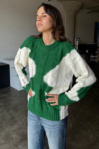 Wrap yourself in cozy style with this Green & Cream Color Block Knit Sweater. Designed with a relaxed fit and a classic crew neck, it features a soft, medium-weight cable knit that adds texture and warmth. The all-over color block pattern offers a modern twist on a timeless piece, making it an effortless addition to any casual outfit. True to size, this sweater is perfect for layering or wearing solo for a chic, laid-back look.