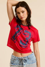 Load image into Gallery viewer, Unleash your sporty side with our Crop Jersey Tee Number 73! This baby tee blends comfort and style, featuring a soft jersey fabric that hugs your body just right. The bold number 73 adds a touch of athletic flair, making it perfect for casual outings or an active day out. Pair it with high-waisted jeans or your favorite shorts for a trendy, effortless look. Elevate your wardrobe with this must-have sporty staple!
