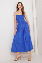 Load image into Gallery viewer, Woman wearing a blue dress with buttons against a white background
