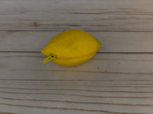 Load image into Gallery viewer, Realistic lemon-shaped coin purse with zipper, keychain ring, and bag charm attachment displayed on a wood background.

