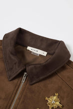 Load image into Gallery viewer, Brown jacket with a gold star patch and visible brand label on a white background
