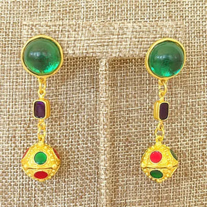 Turn heads with these Ball Drop Statement Earrings. Featuring a large green Gripoix-style stone at the top, accented with blue and green details, these stunning pierced dangle earrings are perfect for any occasion. Measuring approximately 2.25" tall x 0.50" wide, they add a touch of elegance to your ensemble.