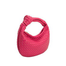 Load image into Gallery viewer, Elegantly designed and soft to the touch, our Woven Leather Fuchsia Top Handle Bag is made of non-toxic and cruelty-free recycled vegan leather. Its small size makes it perfect for all-day wear. The handle is adorned with a knotted detail and the interior features zip and slot pockets.
