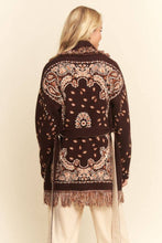 Load image into Gallery viewer, Chocolate brown tapestry-inspired jacquard knit cardigan with shawl collar, self-tie belt and multicolor fringe trim.
