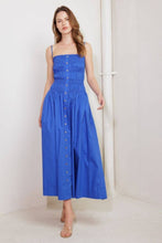 Load image into Gallery viewer, Woman wearing a blue dress with buttons against a white background
