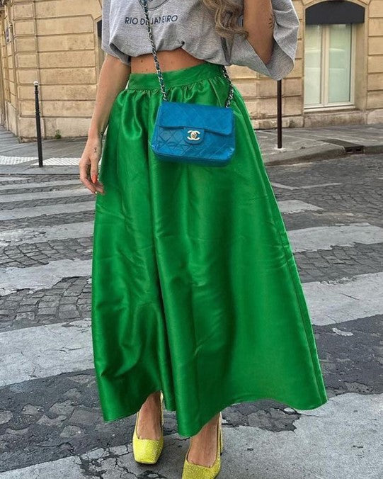 Our Green Satin High Waisted Skirt is the perfect blend of simplicity and elegance. Made from thick, structured fabric in a stunning emerald green, it’s a versatile piece that can be dressed up or down for any occasion. Elevate your wardrobe with this timeless must-have!