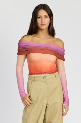 Model wearing a sherbet ombre off-the-shoulder mesh top featuring dreamy gradient colors in peach, pink, purple, and orange. The fitted, stretchy design hugs the body with a romantic, feminine silhouette - perfect for summer nights, brunch dates, or vacation looks. Lightweight and breathable, this statement top from Glam Expressway adds a pop of color and elegance to any outfit.
