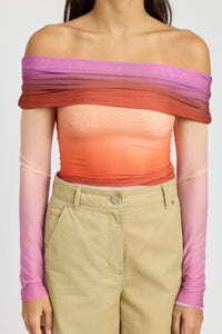 Model wearing a sherbet ombre off-the-shoulder mesh top featuring dreamy gradient colors in peach, pink, purple, and orange. The fitted, stretchy design hugs the body with a romantic, feminine silhouette - perfect for summer nights, brunch dates, or vacation looks. Lightweight and breathable, this statement top from Glam Expressway adds a pop of color and elegance to any outfit.