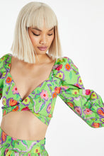 Load image into Gallery viewer, A bright and colorful crop top to give you a playful boho look. This green floral blouse features beautiful flowers that burst in every color of the rainbow. This top is fun and makes resort wear interesting! Perfect to wear with flats or sandals, A must-have item for summer vacations and cookouts! Matching top skirt separately.
