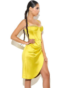 Glam Expressway's Satin Yellow Dress is simply stunning! This lemon yellow corset dress with crystal details is extremely well made with a sturdy bodice, zipper closure and a bit of stretch.  Style Options: Wear this statement making cocktail dress to any fancy occasion! Model pictured is wearing size small.