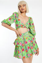 Load image into Gallery viewer, A bright and colorful crop top to give you a playful boho look. This green floral blouse features beautiful flowers that burst in every color of the rainbow. This top is fun and makes resort wear interesting! Perfect to wear with flats or sandals, A must-have item for summer vacations and cookouts! Matching top skirt separately.
